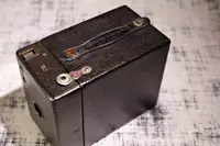 Close-up of leather strap on vintage camera